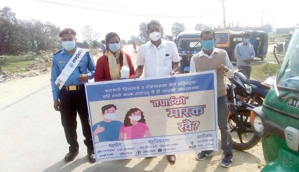 हसुलिया बजारमे मास्क वितरण